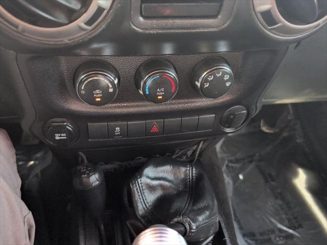 used 2015 Jeep Wrangler car, priced at $16,303