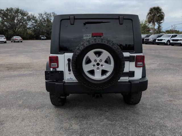 used 2013 Jeep Wrangler Unlimited car, priced at $16,299