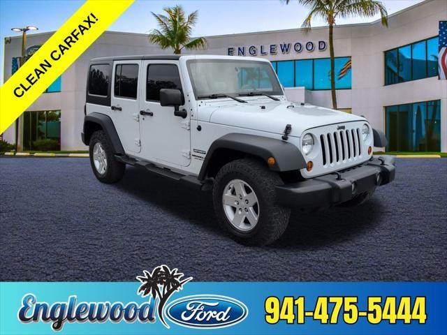 used 2013 Jeep Wrangler Unlimited car, priced at $16,299