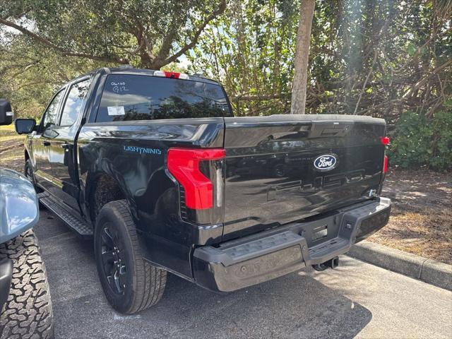 new 2025 Ford F-150 Lightning car, priced at $74,015