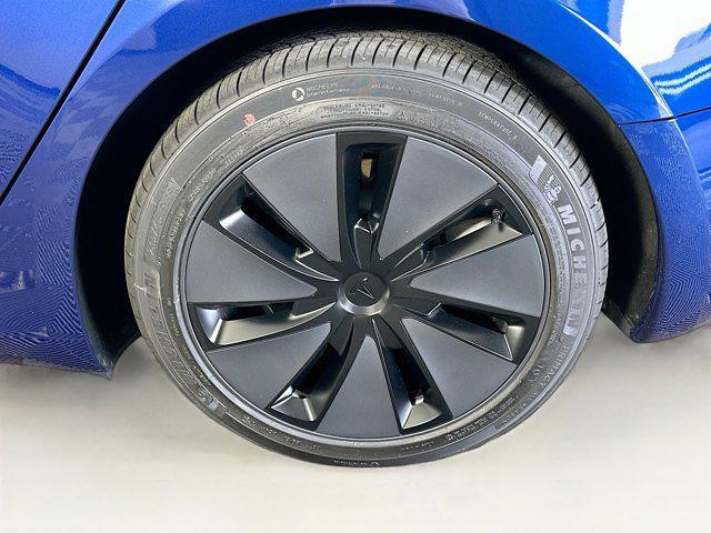 used 2025 Tesla Model 3 car, priced at $34,297
