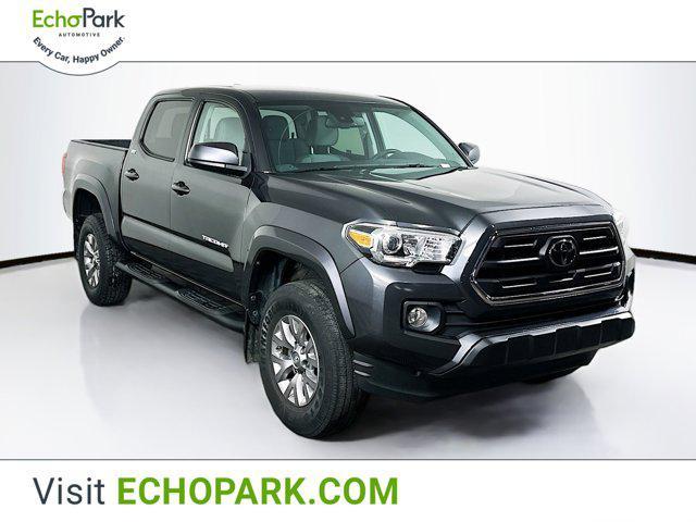 used 2018 Toyota Tacoma car, priced at $23,399