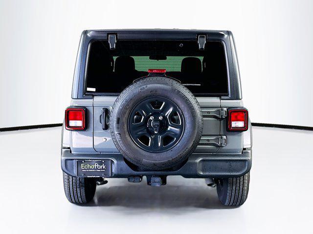 used 2023 Jeep Wrangler car, priced at $27,589