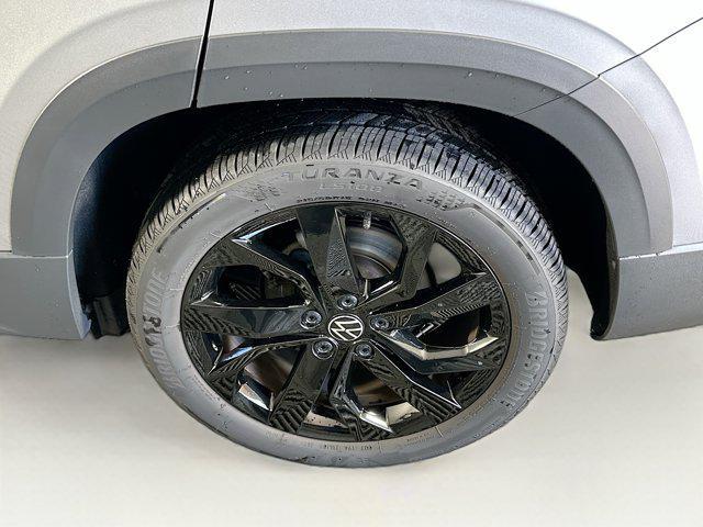 used 2024 Volkswagen Taos car, priced at $20,897