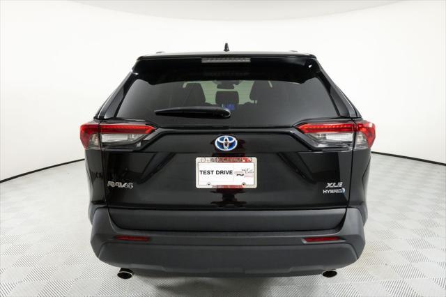 used 2023 Toyota RAV4 Hybrid car, priced at $35,009