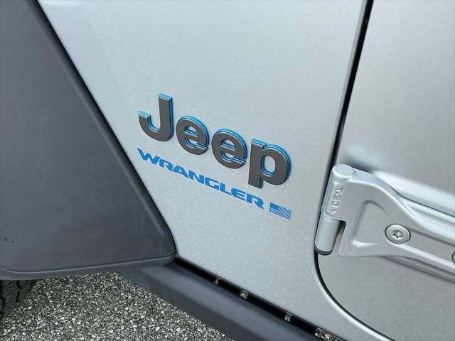 used 2023 Jeep Wrangler 4xe car, priced at $27,139