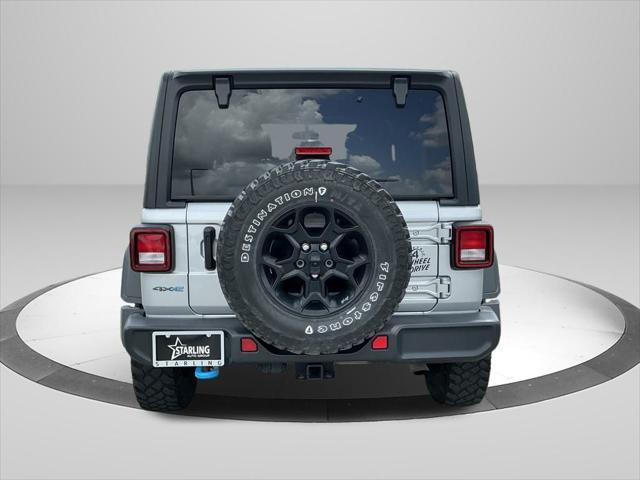 used 2023 Jeep Wrangler 4xe car, priced at $27,139