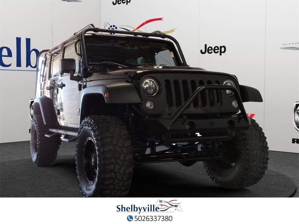 used 2015 Jeep Wrangler Unlimited car, priced at $24,994