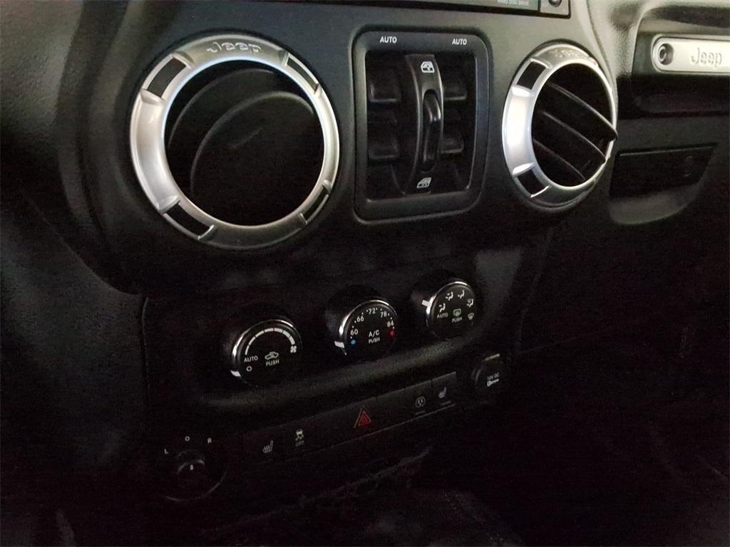 used 2015 Jeep Wrangler Unlimited car, priced at $24,994