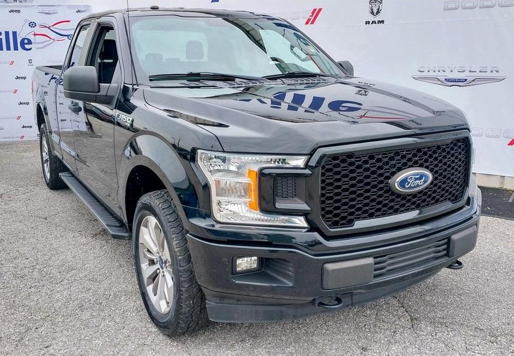 used 2018 Ford F-150 car, priced at $19,395