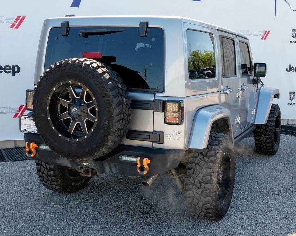 used 2013 Jeep Wrangler Unlimited car, priced at $13,994