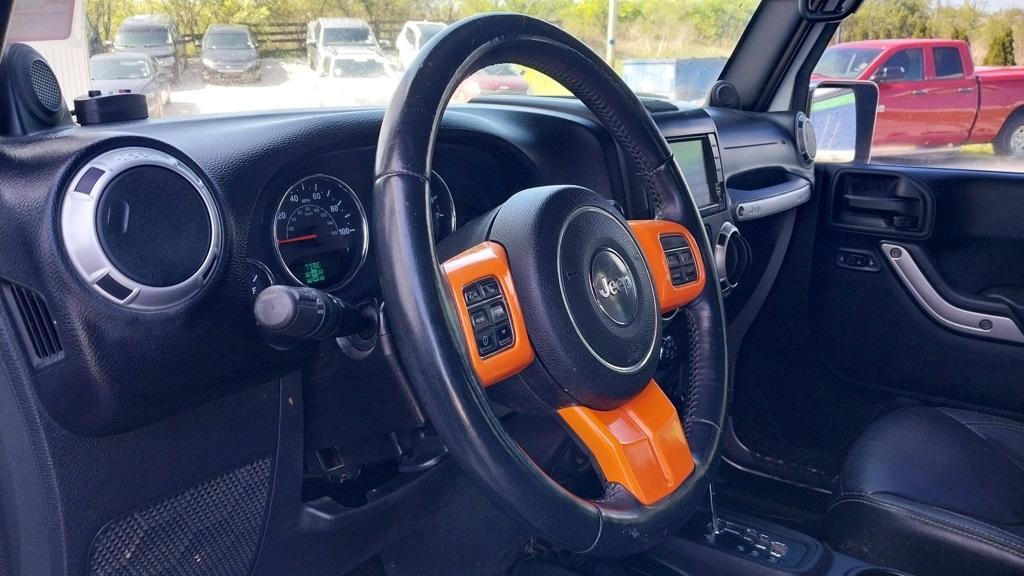 used 2013 Jeep Wrangler Unlimited car, priced at $13,994
