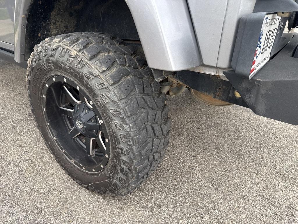 used 2013 Jeep Wrangler Unlimited car, priced at $16,994