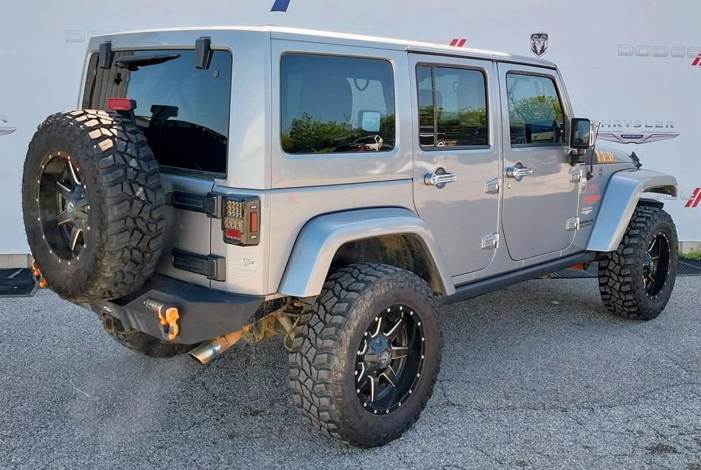 used 2013 Jeep Wrangler Unlimited car, priced at $13,994