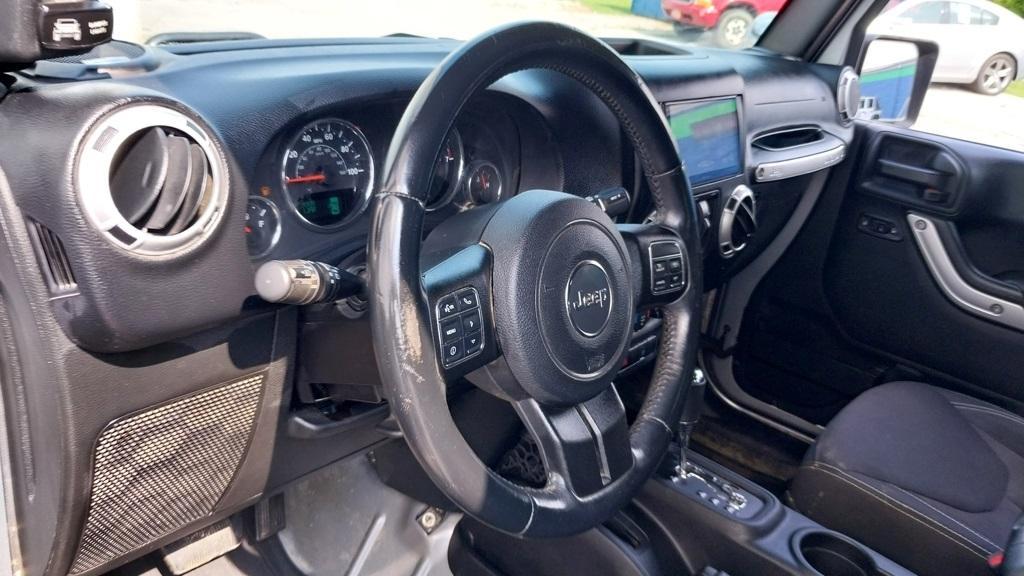 used 2015 Jeep Wrangler Unlimited car, priced at $19,998