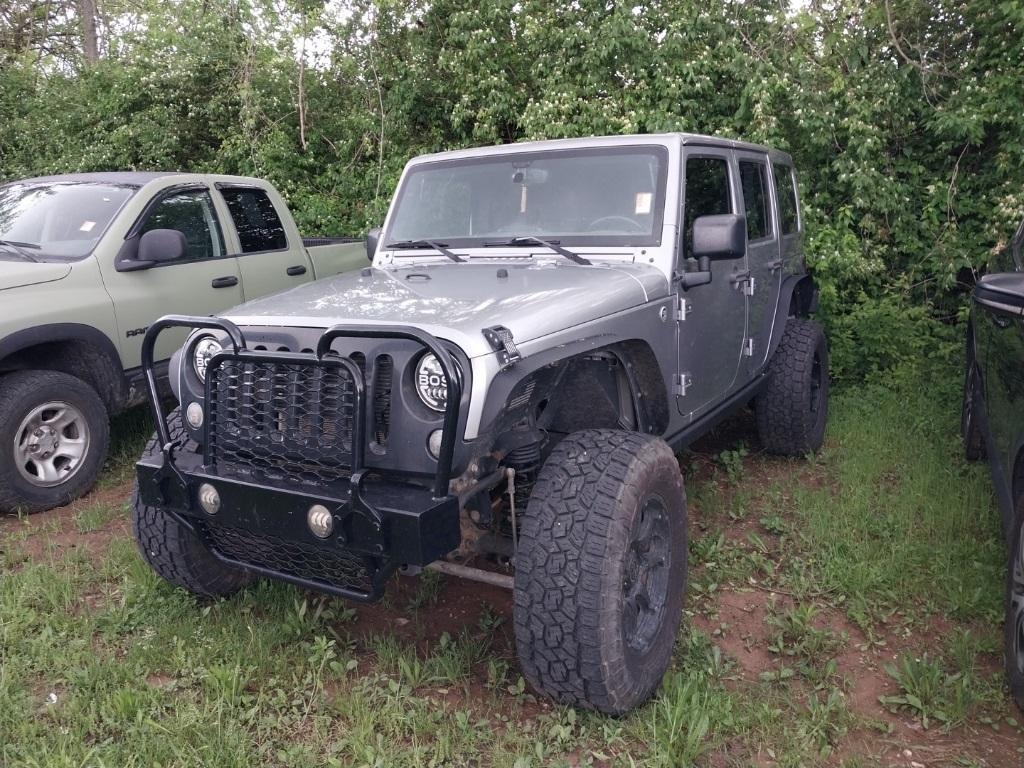 used 2015 Jeep Wrangler Unlimited car, priced at $17,495