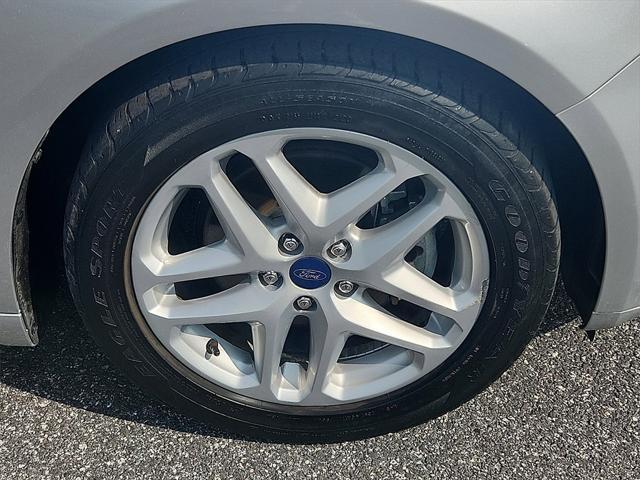 used 2015 Ford Fusion car, priced at $11,999