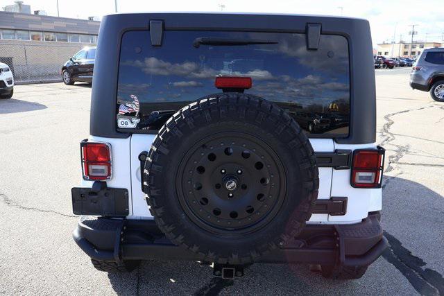 used 2018 Jeep Wrangler JK Unlimited car, priced at $23,995