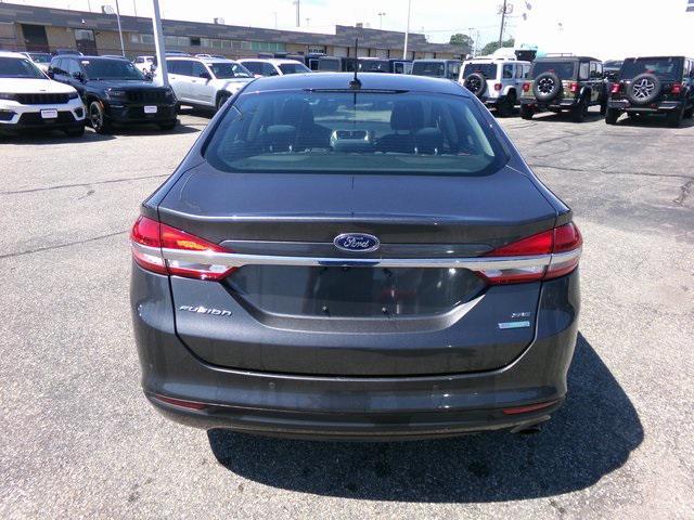 used 2018 Ford Fusion car, priced at $12,495