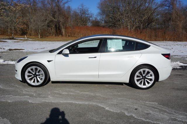 used 2022 Tesla Model 3 car, priced at $27,950