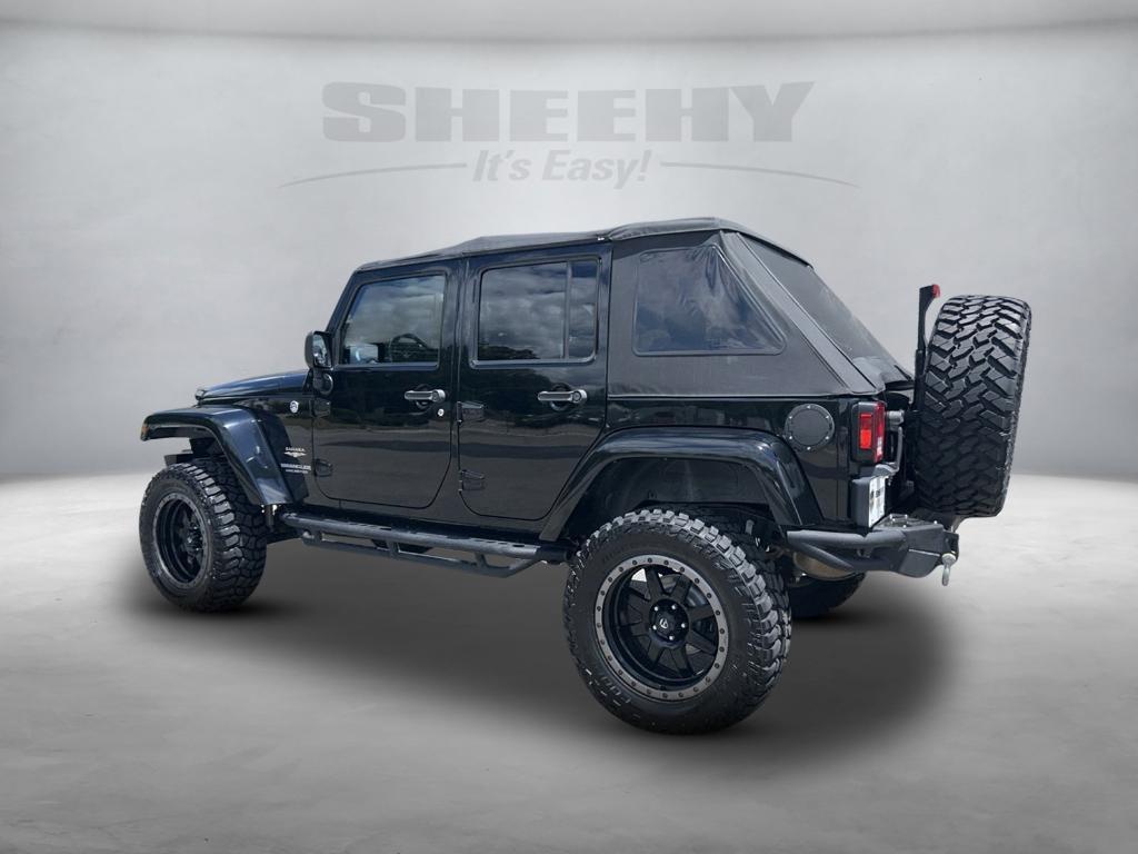 used 2013 Jeep Wrangler Unlimited car, priced at $15,980
