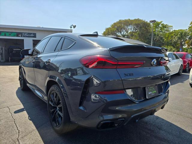 used 2021 BMW X6 car, priced at $37,699