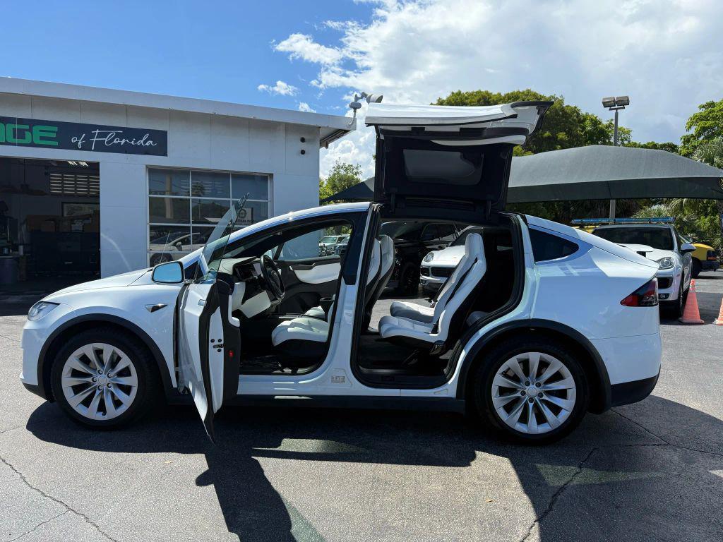 used 2018 Tesla Model X car, priced at $26,899