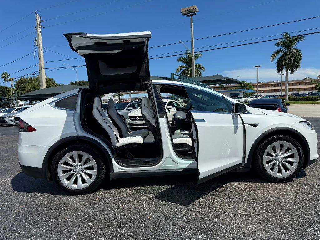 used 2018 Tesla Model X car, priced at $26,899