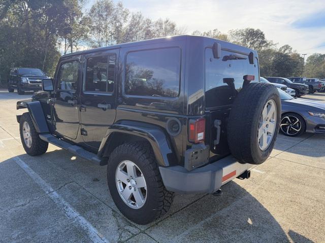 used 2012 Jeep Wrangler Unlimited car, priced at $13,987