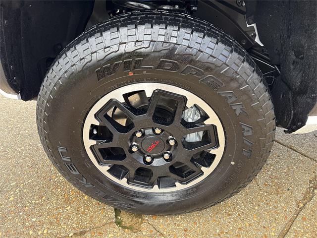 used 2025 Toyota Tacoma car, priced at $48,534