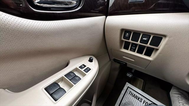 used 2013 Nissan Quest car, priced at $11,900