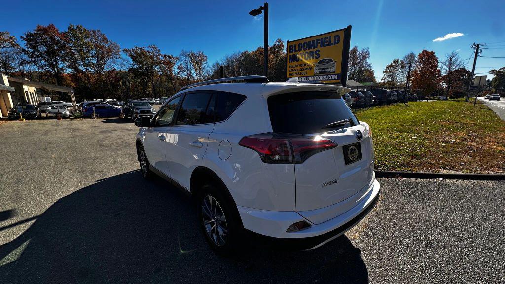 used 2018 Toyota RAV4 Hybrid car, priced at $17,890