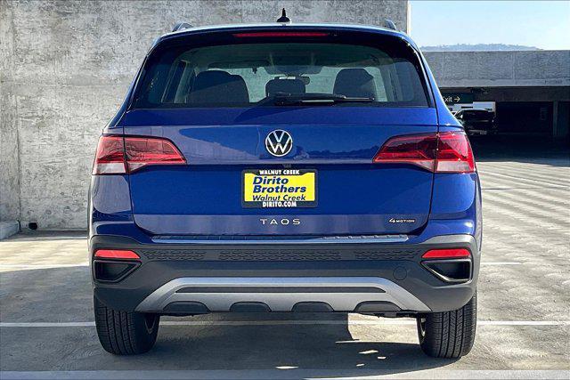 new 2024 Volkswagen Taos car, priced at $28,098