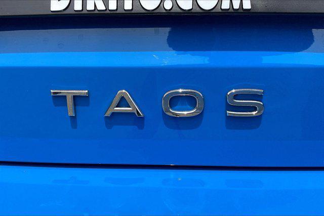 used 2023 Volkswagen Taos car, priced at $24,881