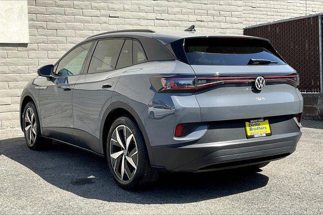 used 2023 Volkswagen ID.4 car, priced at $26,882