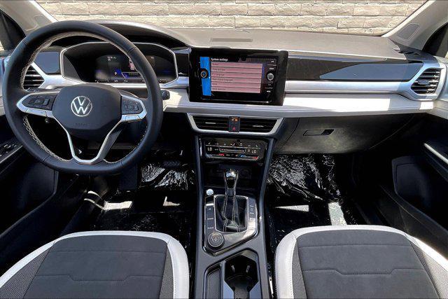 new 2025 Volkswagen Taos car, priced at $33,311
