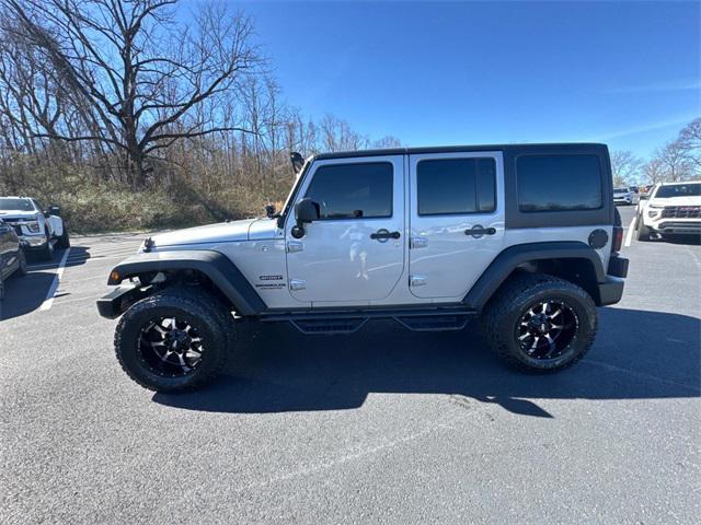 used 2014 Jeep Wrangler Unlimited car, priced at $15,401