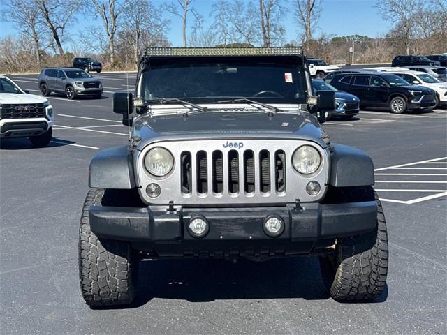 used 2014 Jeep Wrangler Unlimited car, priced at $15,401