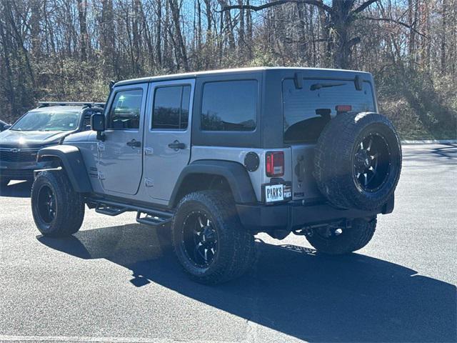 used 2014 Jeep Wrangler Unlimited car, priced at $15,401