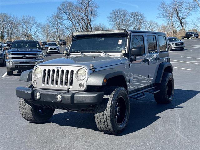 used 2014 Jeep Wrangler Unlimited car, priced at $15,401