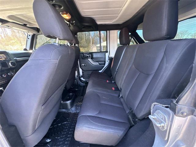 used 2014 Jeep Wrangler Unlimited car, priced at $15,401