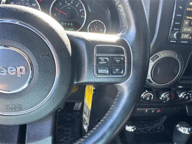 used 2014 Jeep Wrangler Unlimited car, priced at $15,401