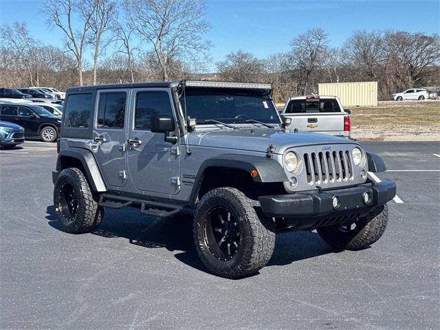 used 2014 Jeep Wrangler Unlimited car, priced at $15,401