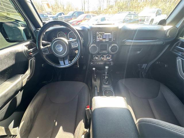 used 2014 Jeep Wrangler Unlimited car, priced at $15,401