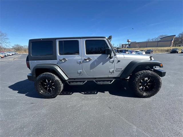 used 2014 Jeep Wrangler Unlimited car, priced at $15,401