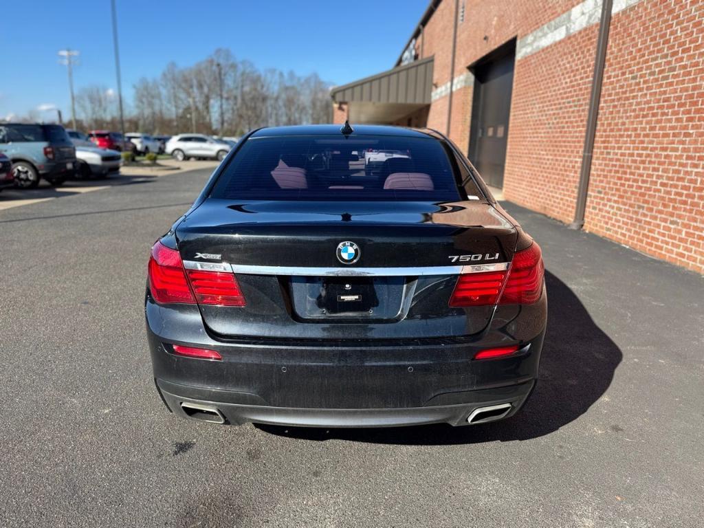 used 2014 BMW 750 car, priced at $15,000