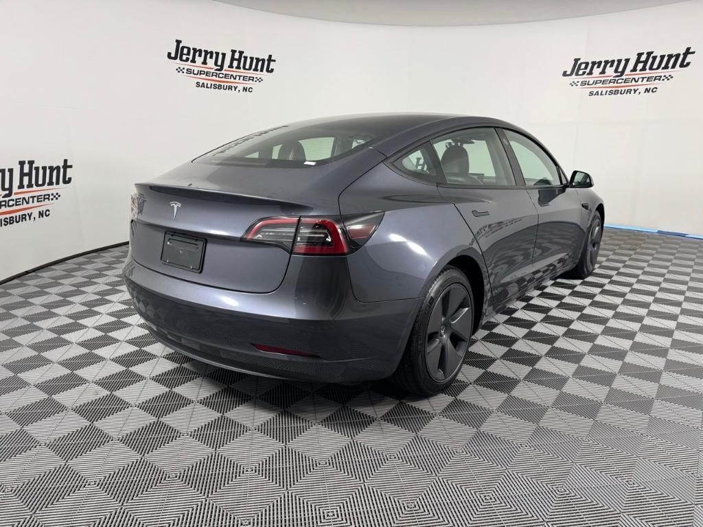 used 2023 Tesla Model 3 car, priced at $27,788