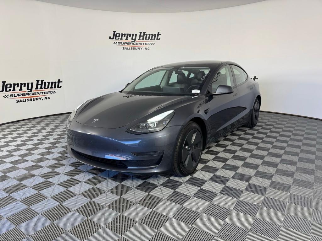 used 2023 Tesla Model 3 car, priced at $27,788