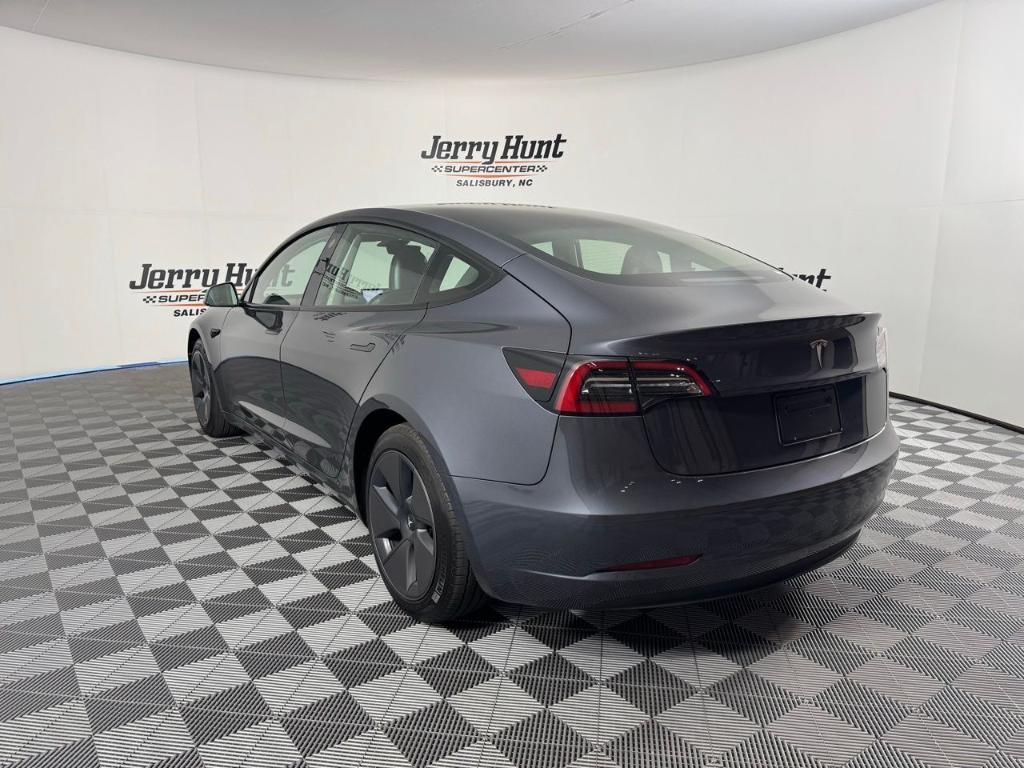 used 2023 Tesla Model 3 car, priced at $27,788