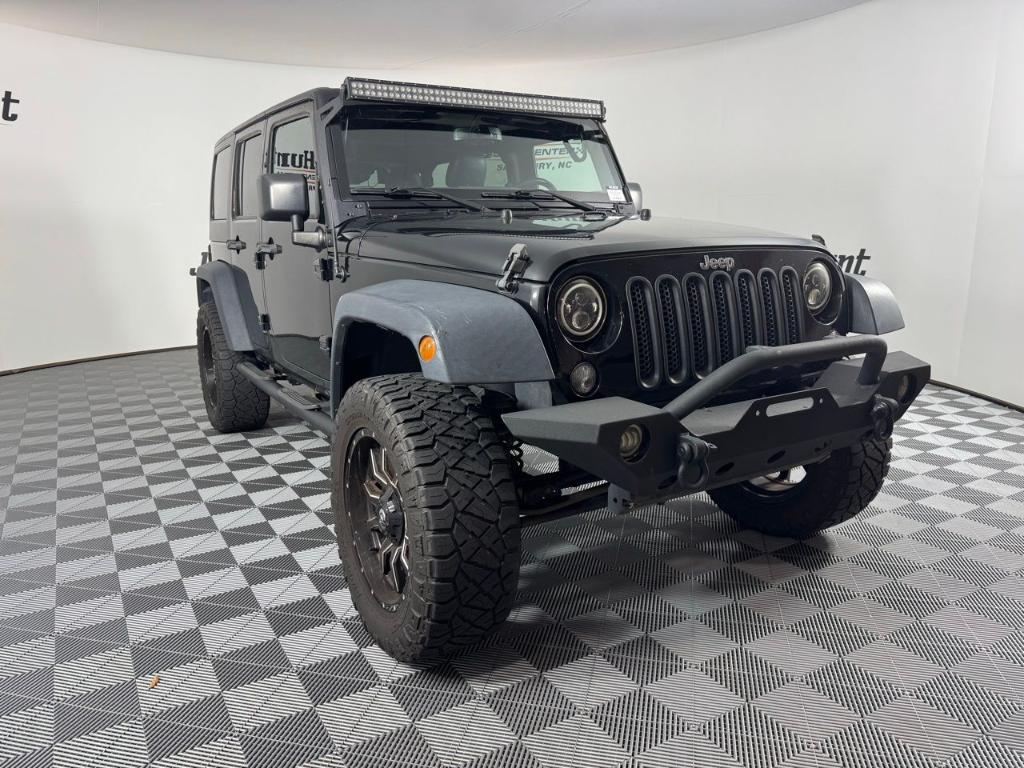 used 2016 Jeep Wrangler Unlimited car, priced at $18,534